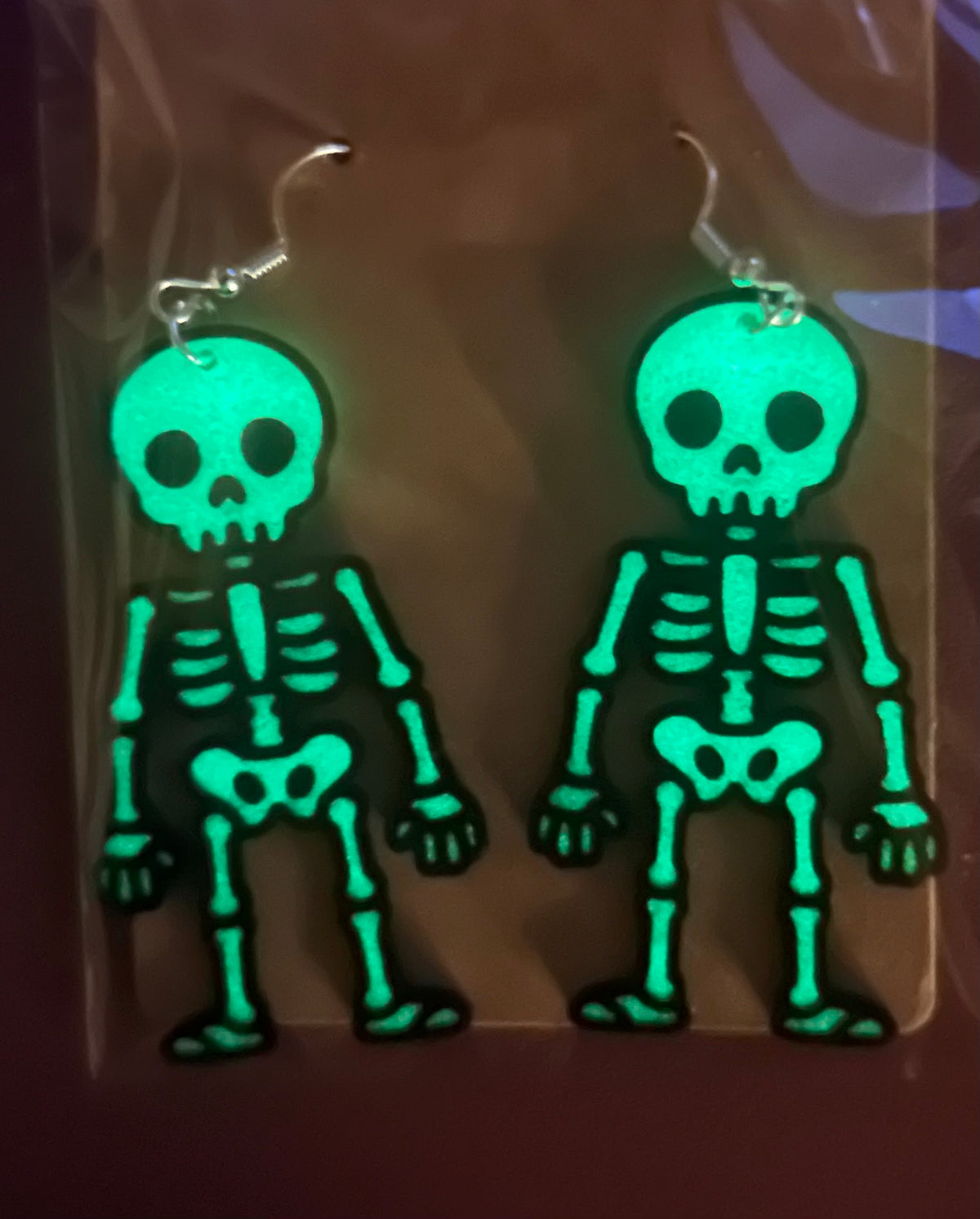 Glow in the dark skeleton earrings