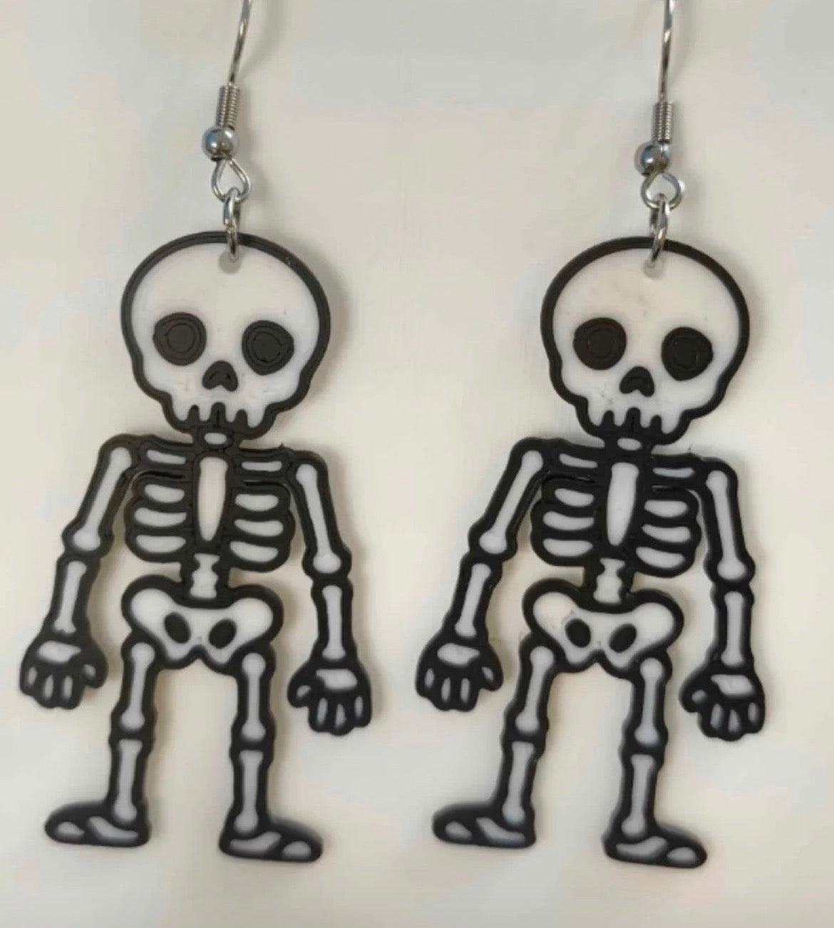 Glow in the dark skeleton earrings